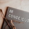 the phrase be conscious on a pin board
